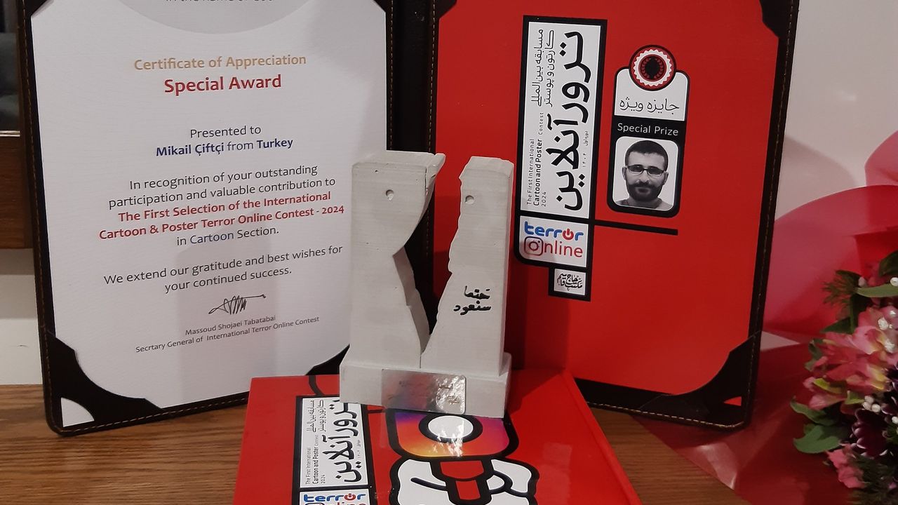 Rehber TV karikatüristi İran'da ödül aldı.