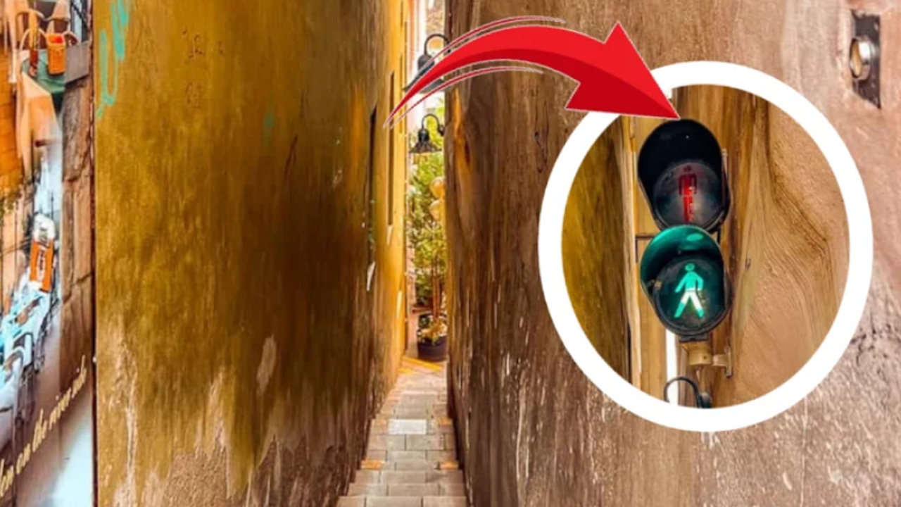 Sokakta iki kişilik yer yok: Karşı tarafa trafik ışığı kullanılarak geçiliyor