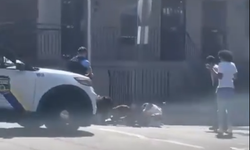 ABD'de bir polis, köpek saldırısına uğrayan adamı kurtarmak için köpekleri silahla vurdu