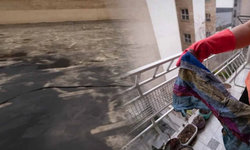 Tüm yapıların ve yolların üstünü koyu siyah bir tabaka kaplandı: Pencereleri sıkıca kapatın dışarı adım atmayın!