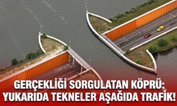 Gerçekliği sorgulatan köprü: Yukarıda tekneler aşağıda trafik!