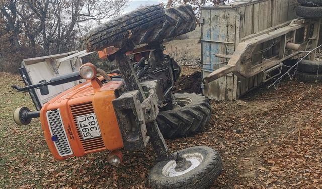 Devrilen traktörün altında kalan kadın can verdi