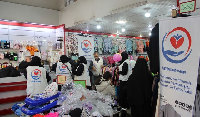 Cizre'de yetim çocuklara bot ve mont desteği