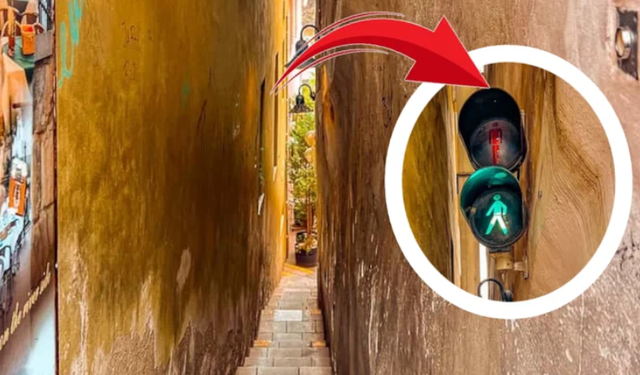 Sokakta iki kişilik yer yok: Karşı tarafa trafik ışığı kullanılarak geçiliyor