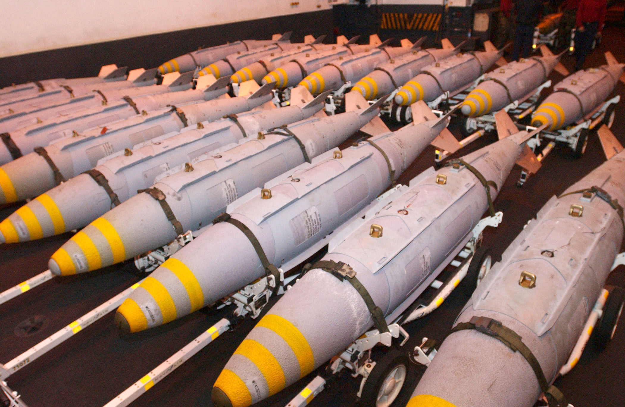 U S Navy 030323 N 1328 C 507 G B U 31 Joint Direct Attack Munitions ( J D A M) Are Staged In The Hanger Bay